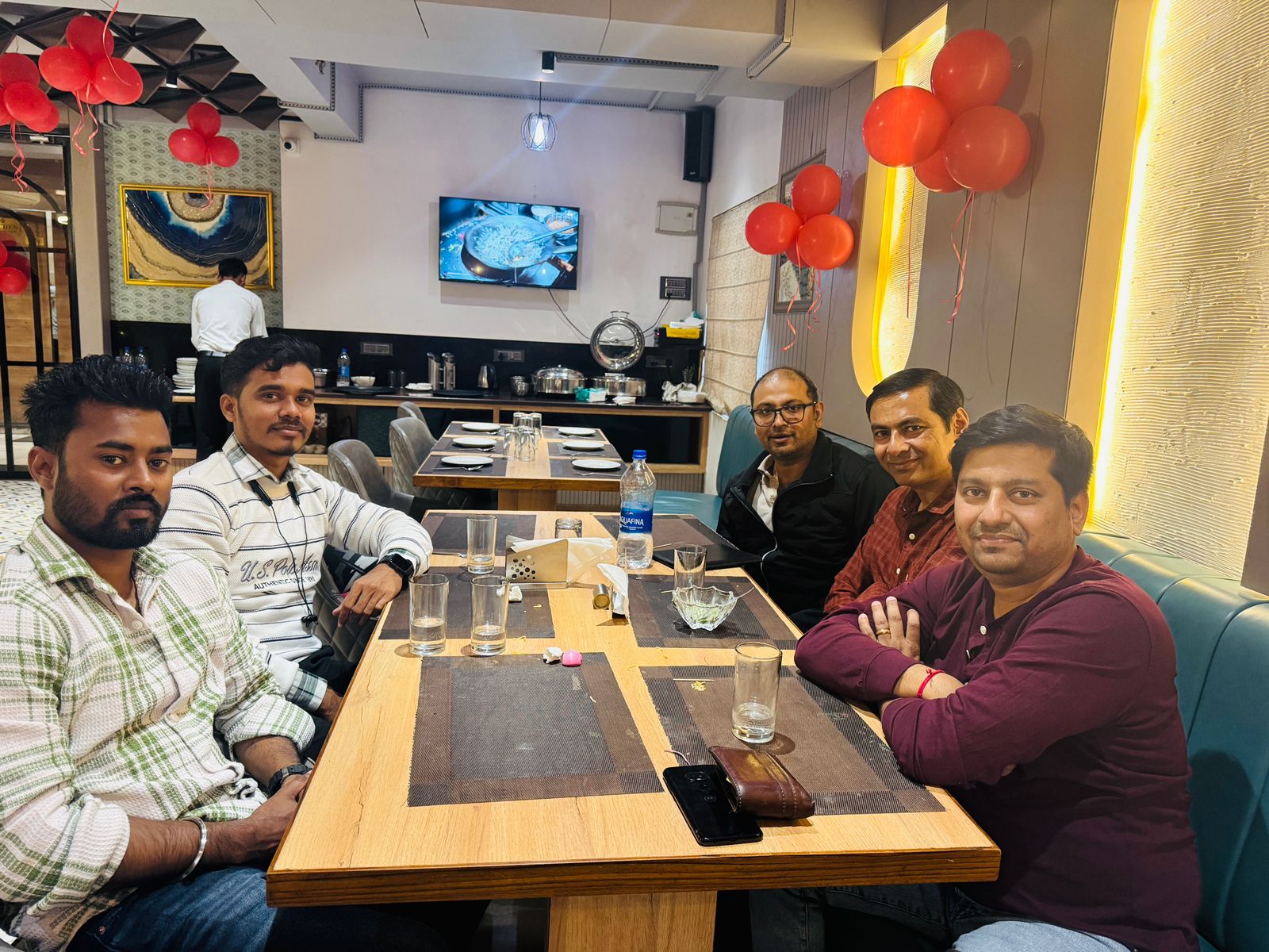 Christmas team lunch with red balloons
