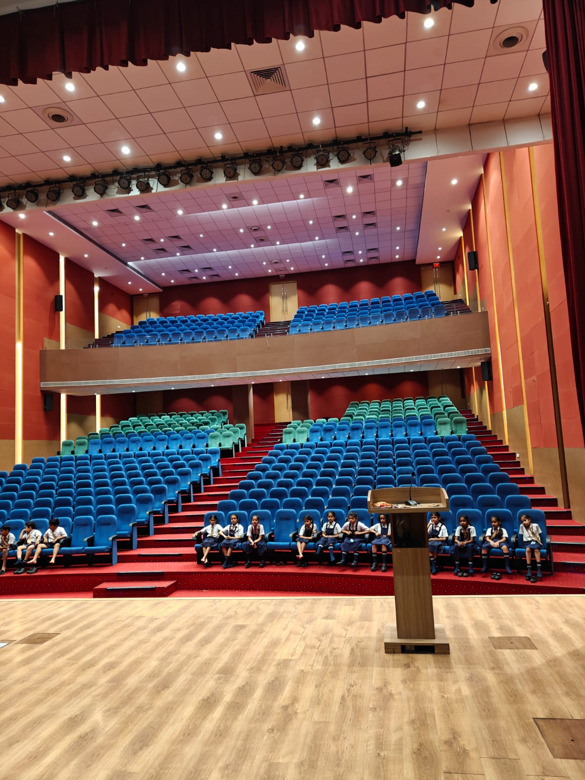 Team at school auditorium